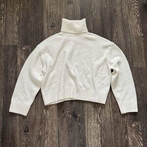 HM ivory turtleneck sweater